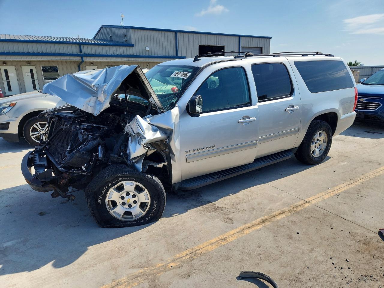 2011 Chevrolet Suburban LS, VIN 1GNSCHE0XBR167799 — Front end