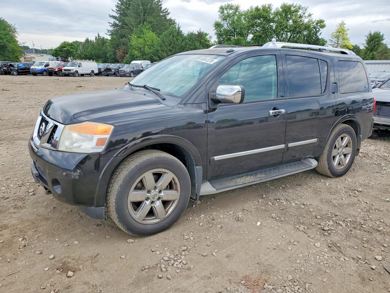 2011 Nissan Armada Platinum, VIN 5N1AA0NC8BN607429 — Бок