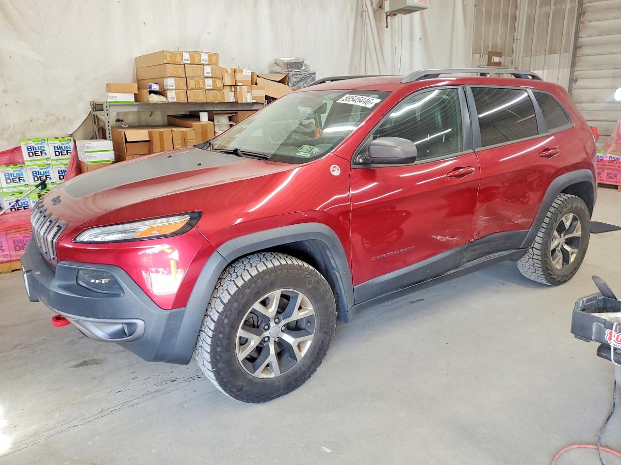 2015 Jeep Cherokee Trailhawk, VIN 1C4PJMBB0FW745497 — Бок