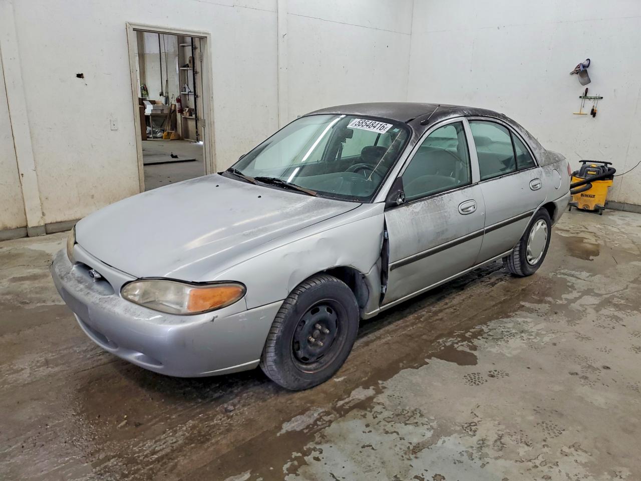 1999 Ford Escort LX, VIN 1FAFP10P9XW277753 — Side