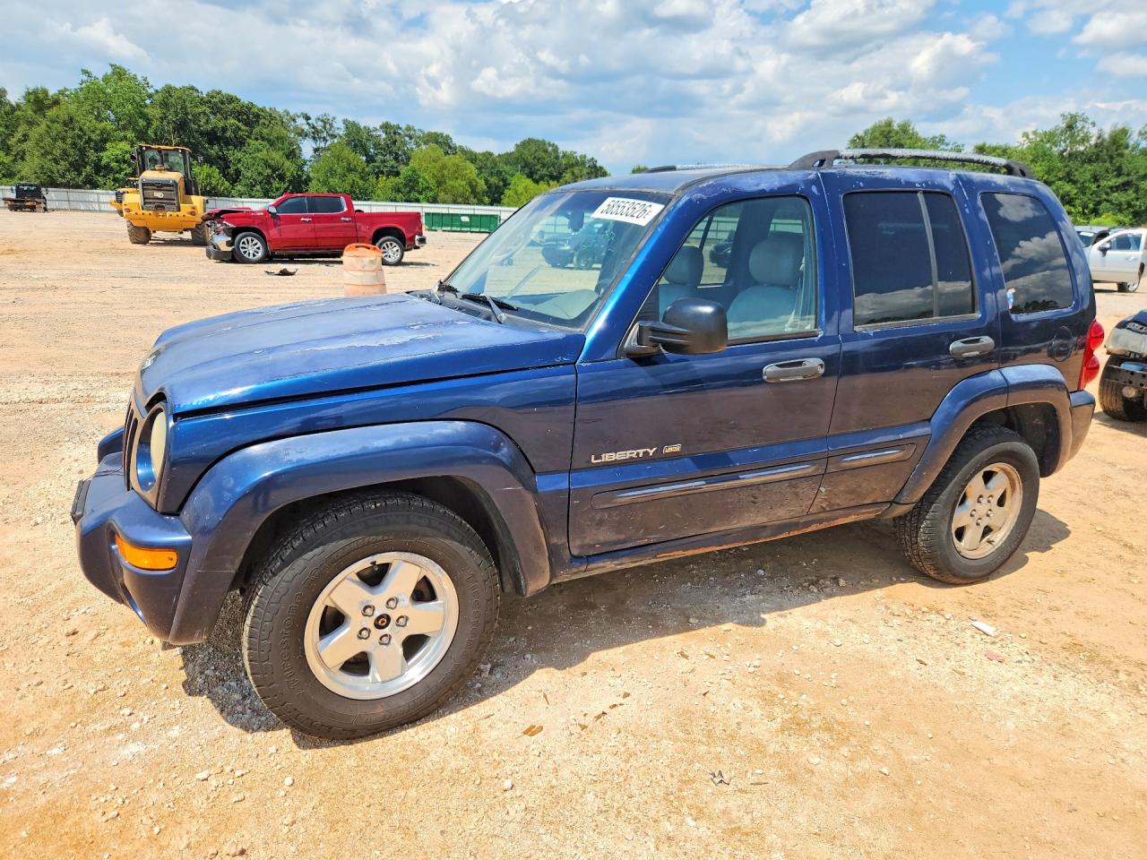 2003 Jeep Liberty Limited, VIN 1J8GL58K33W677529 — Зад
