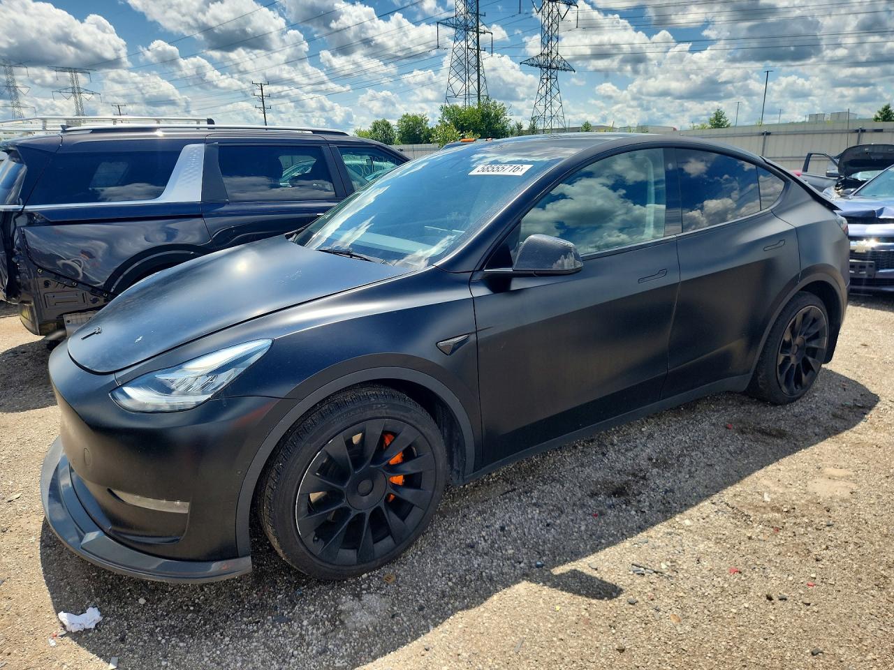 2022 Tesla Model Y Long Range, VIN 7SAYGDEE9NF357294 — Rear end