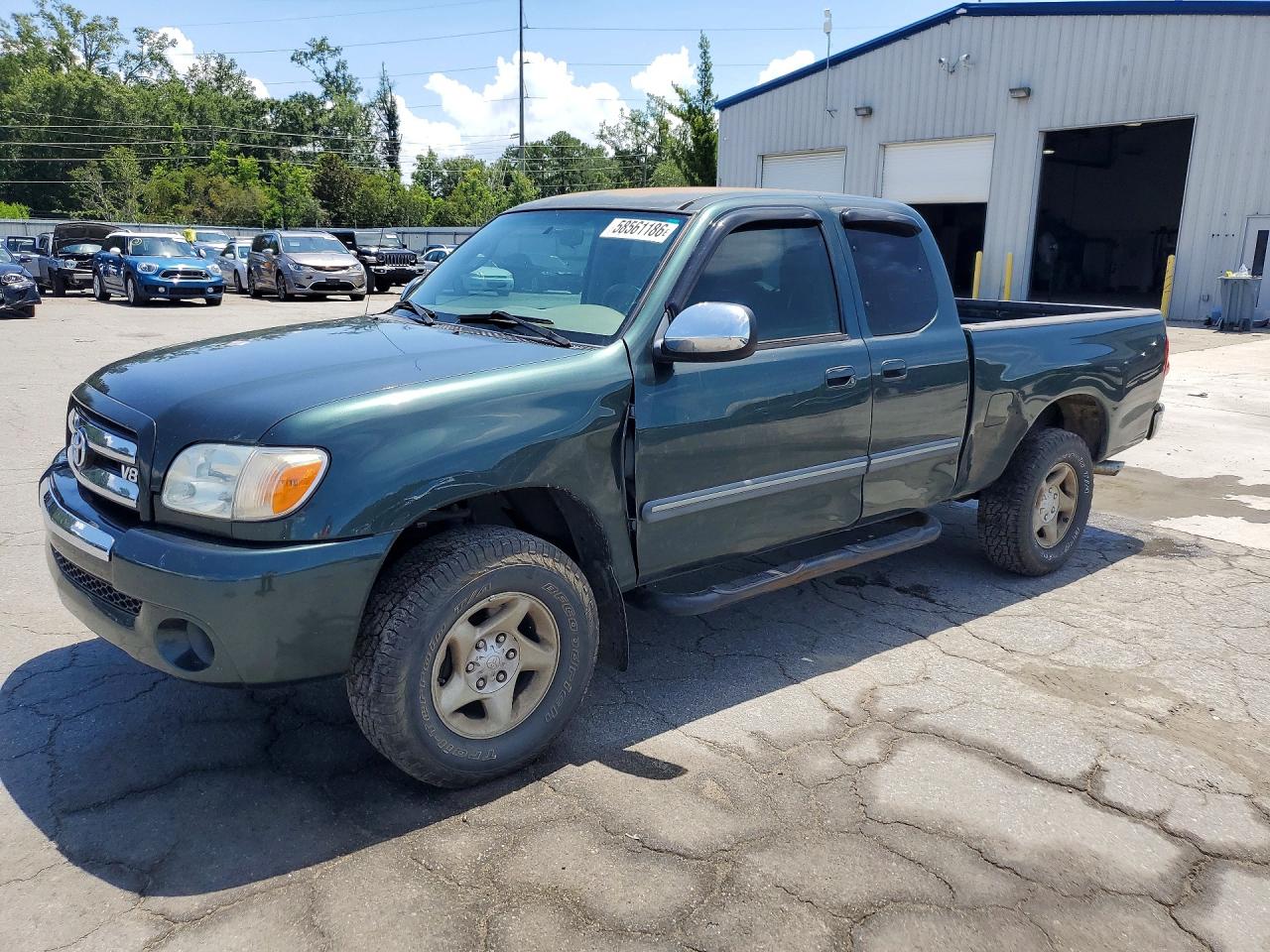 2005 Toyota Tundra SR5, VIN 5TBBT44165S469424 — Бок