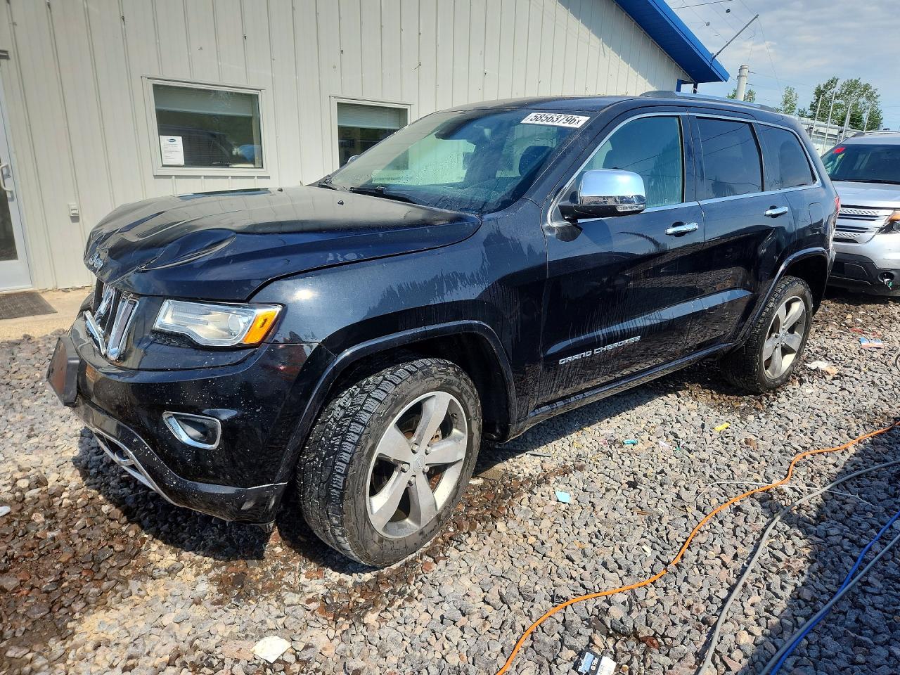 2015 Jeep Grand Cherokee Overland, VIN 1C4RJFCGXFC807701 — Front end