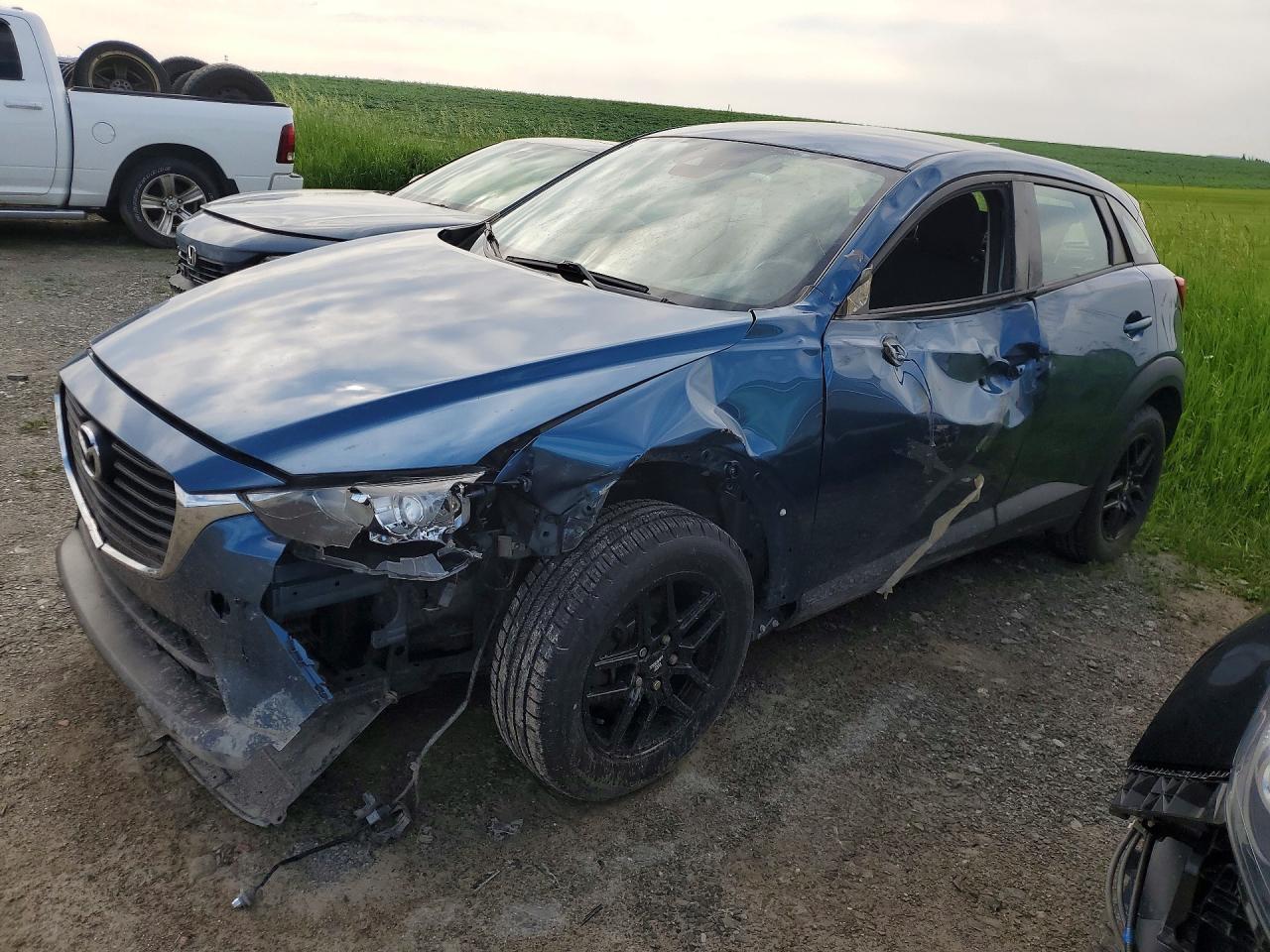 2018 Mazda CX-3 Sport, VIN JM1DKDB73J0313493 — Side