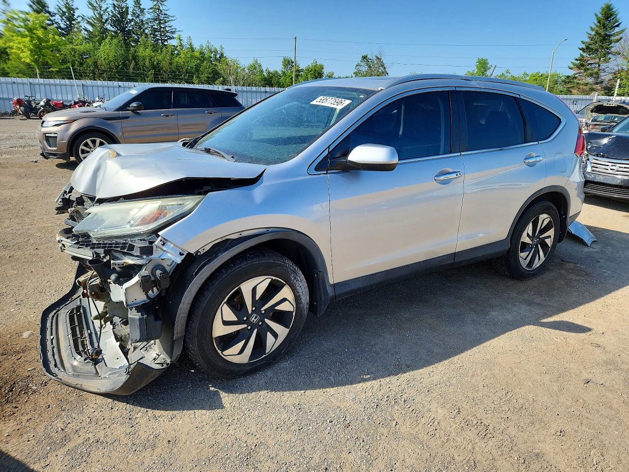 2016 Honda CR-V Touring, VIN 5J6RM4H98GL807164 — Перед