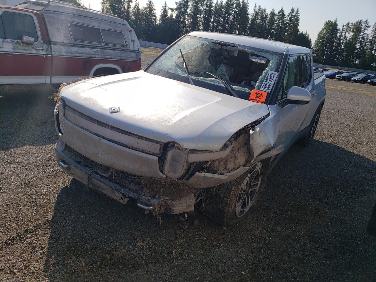2023 Rivian R1T Adventure, VIN 7FCTGAAA5PN018541 — Rollover