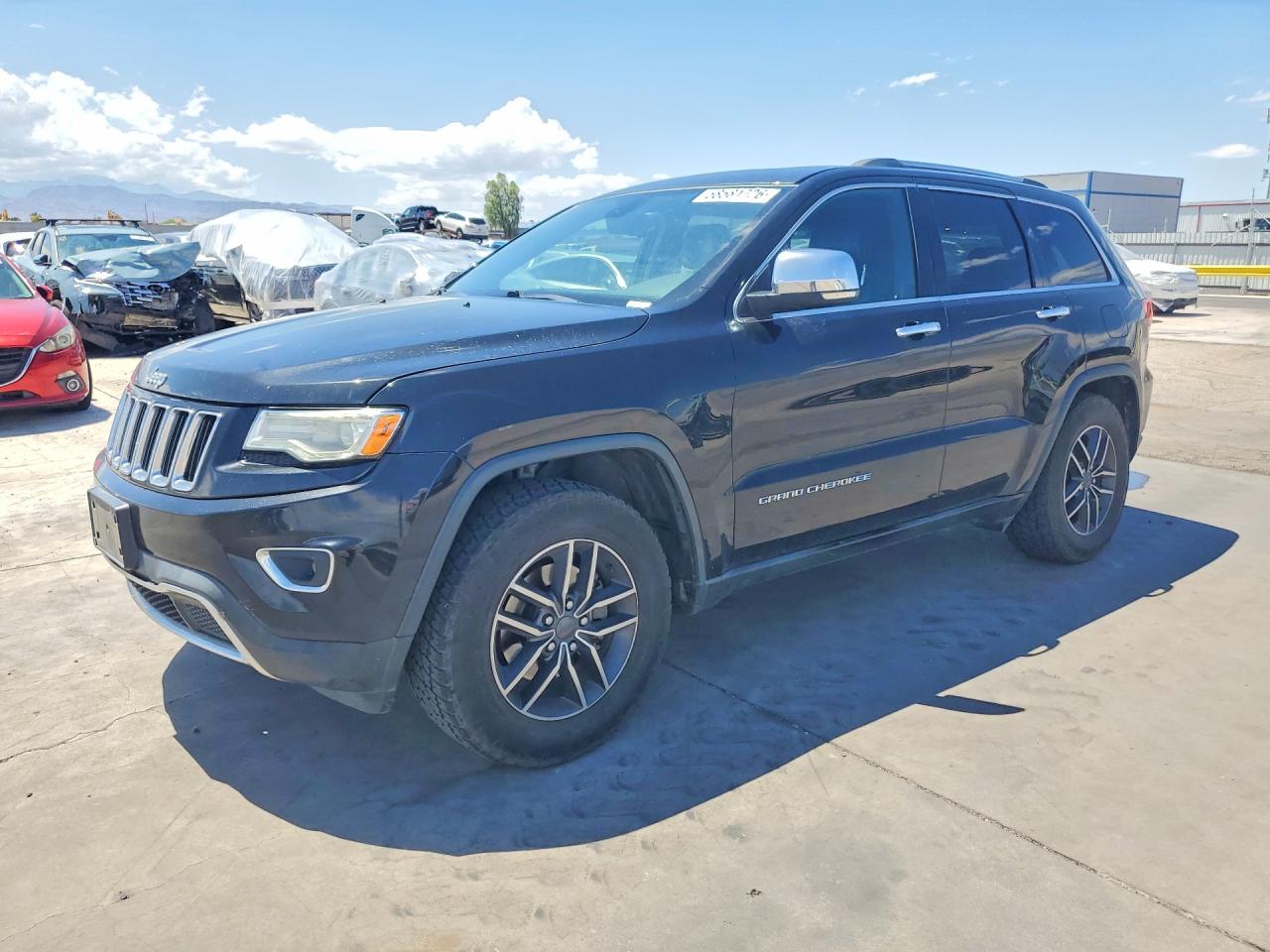 2016 Jeep Grand Cherokee Limited, VIN 1C4RJEBG1GC329004 — Бок