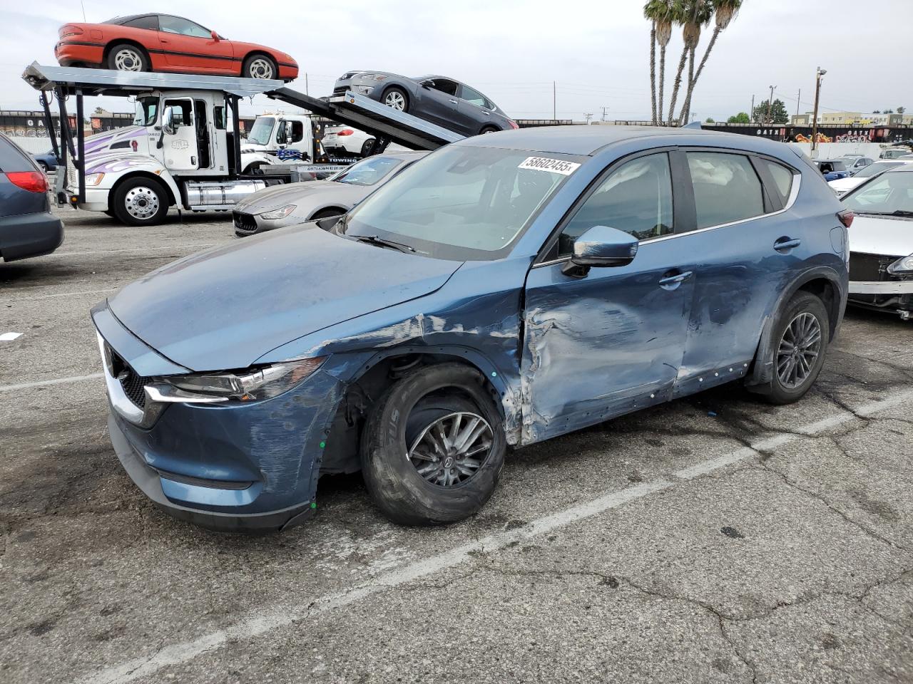 2021 Mazda CX-5 Sport, VIN JM3KFBBM9M0375059 — Side