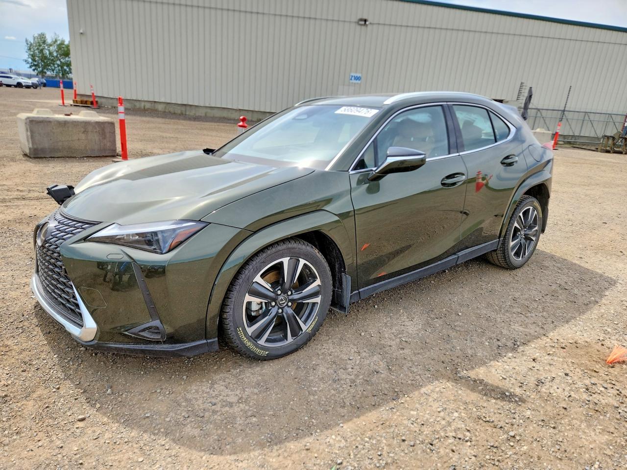 2025 Lexus UX 300h Premium, VIN JTHUCJDH5S2012956 — Бок