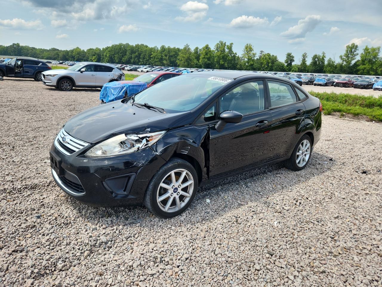 2012 Ford Fiesta SE, VIN 3FADP4BJXCM105002 — Front end