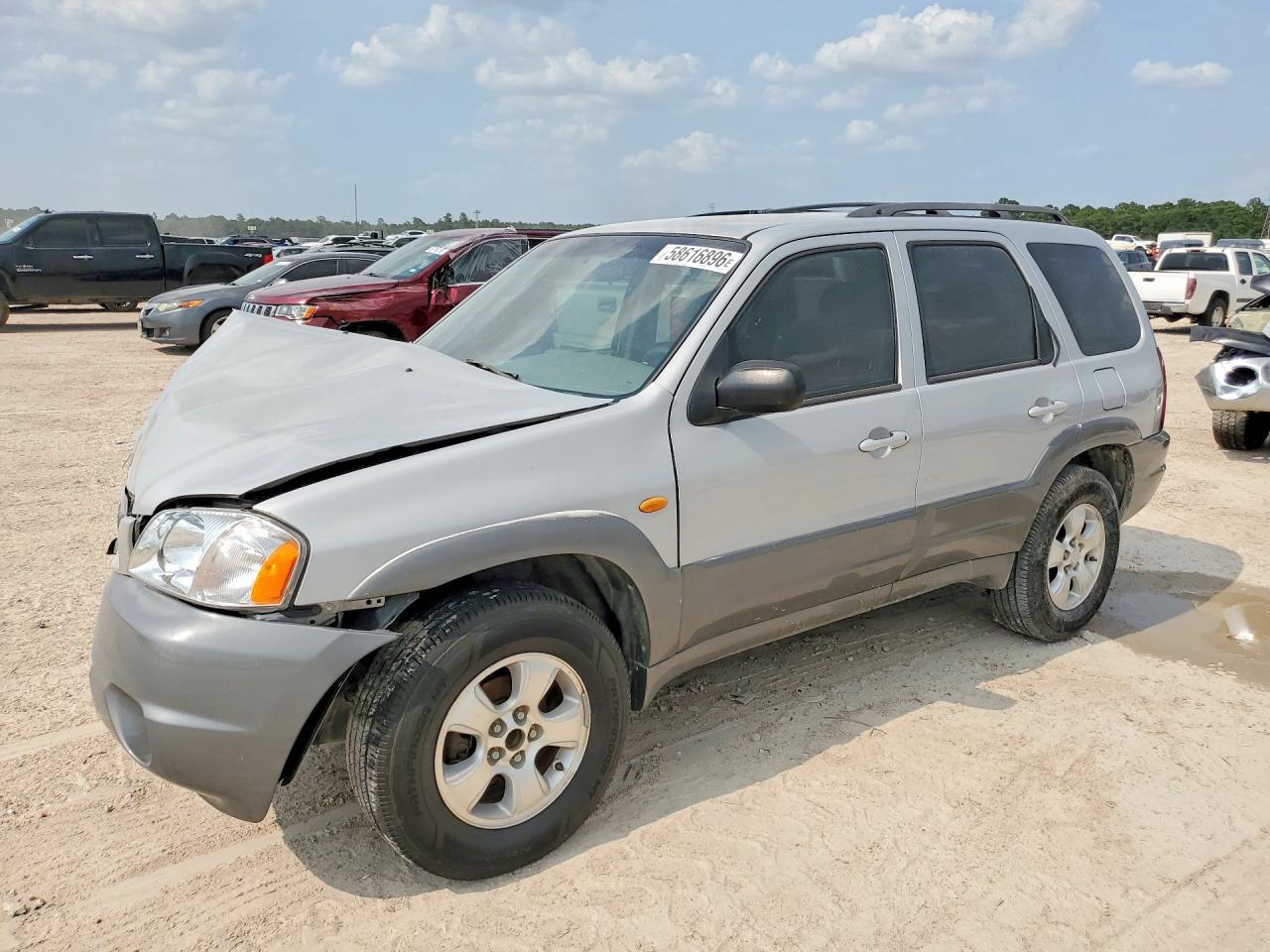 2002 Mazda Tribute LX, VIN 4F2YU09112KM34583 — Front end