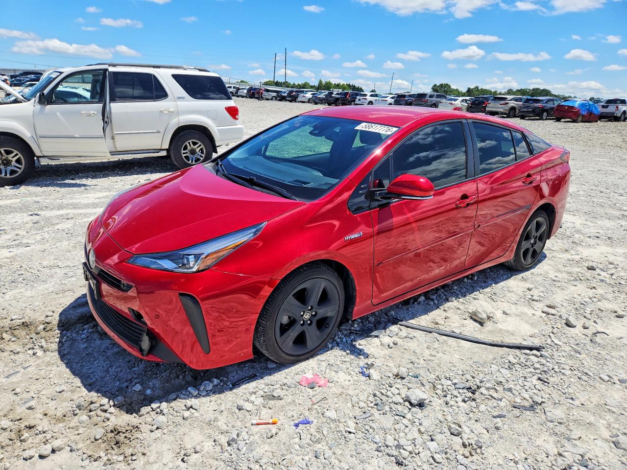 2020 Toyota Prius LE, VIN JTDKARFU2L3105257 — Side