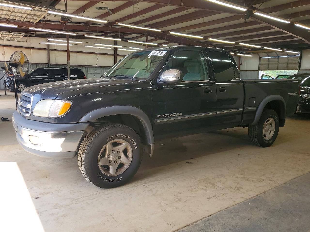2002 Toyota Tundra SR5, VIN 5TBRT34122S322800 — Side