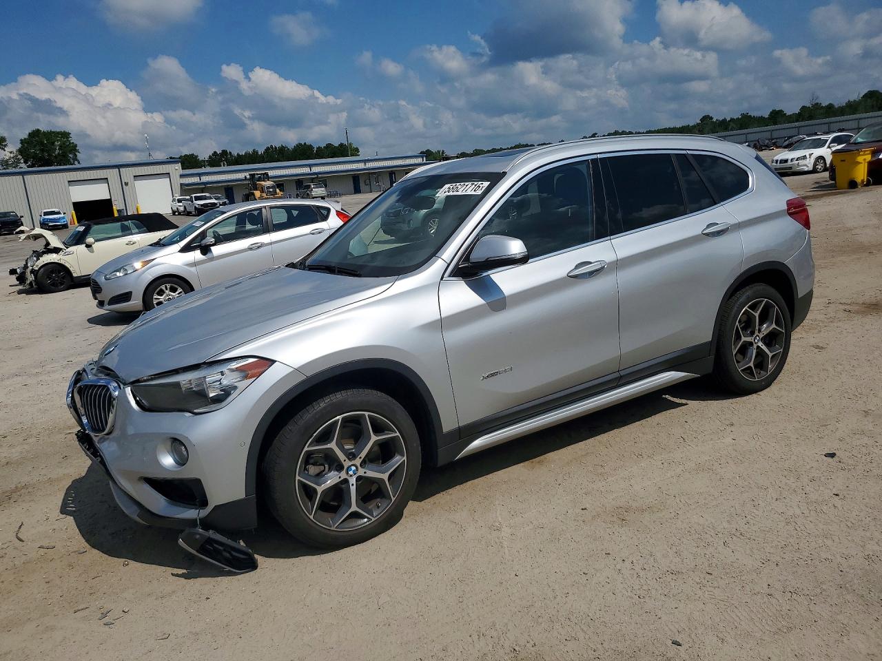 2018 BMW X1 xDrive28i, VIN WBXHT3C36J5L24529 — Front end
