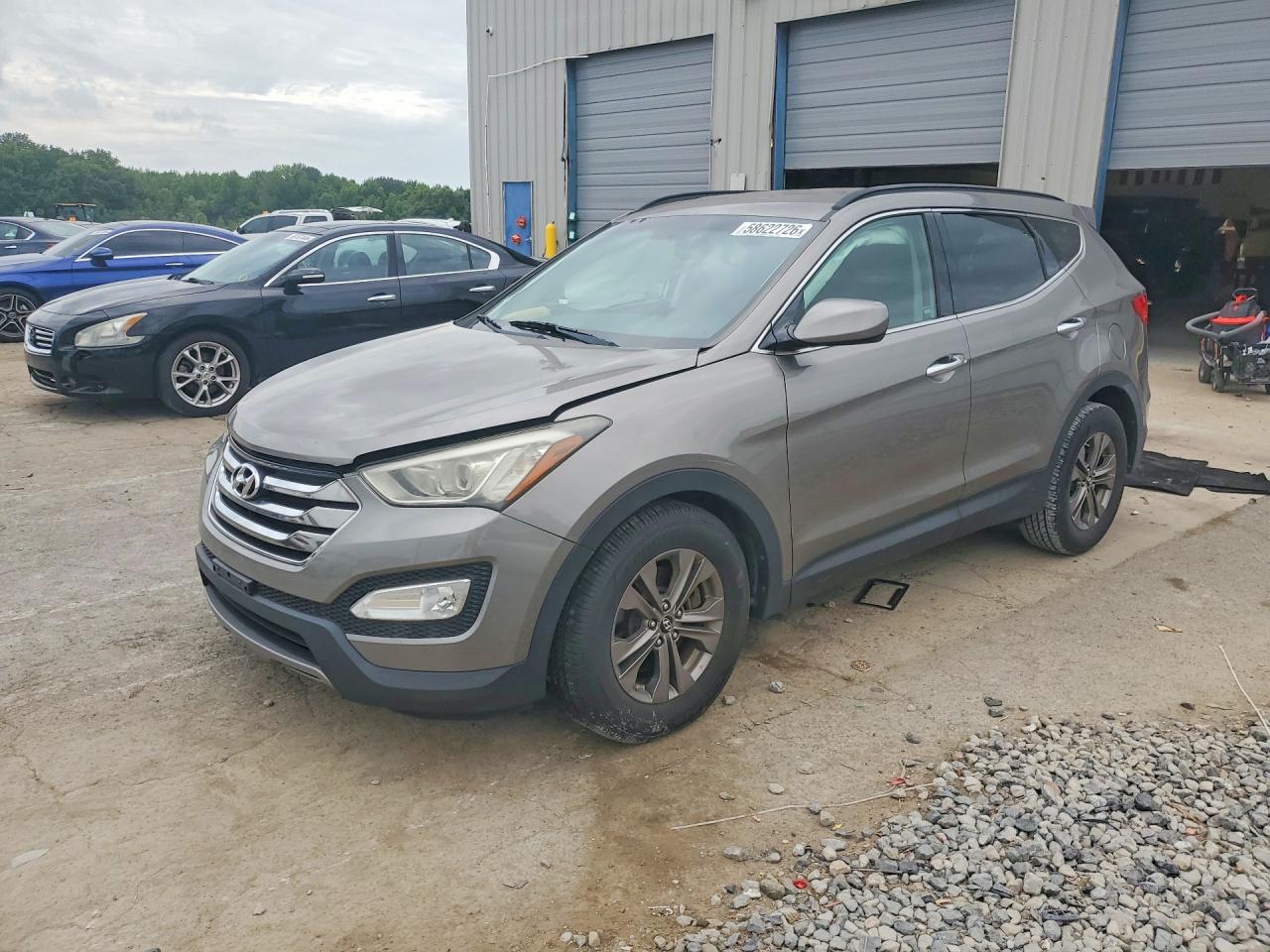 2013 Hyundai Santa Fe Sport, VIN 5XYZU3LB4DG006314 — Front end