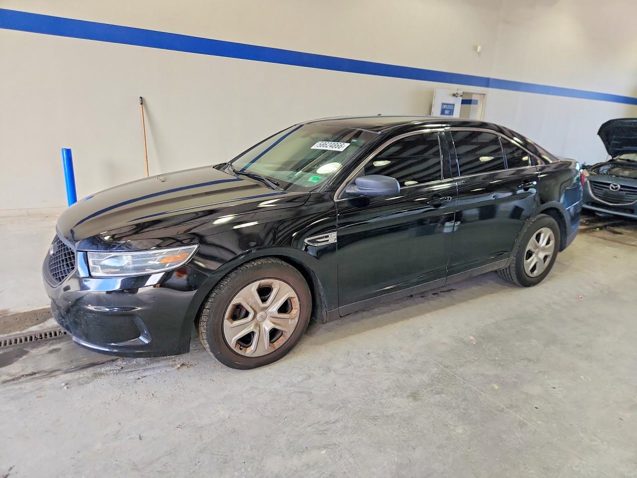 2015 Ford Police Interceptor, VIN 1FAHP2L84FG208092 — Rear end