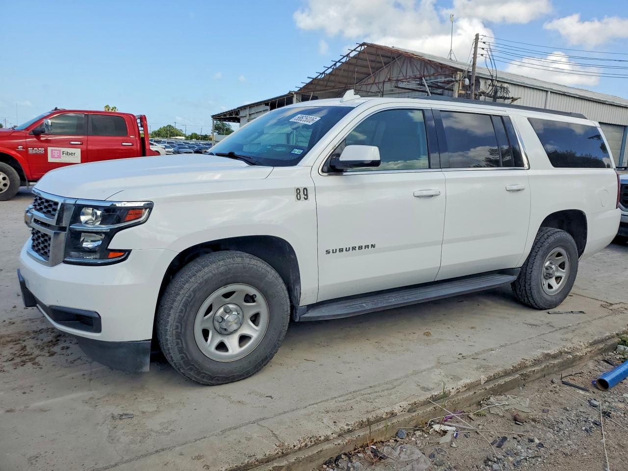 2020 Chevrolet Suburban, VIN 1GNSCKEC6LR103574 — Hail