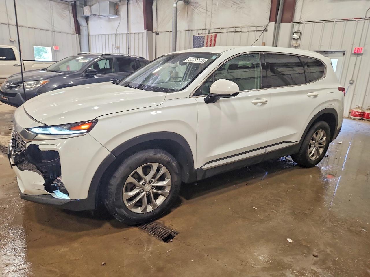 2020 Hyundai Santa Fe SEL, VIN 5NMS3CAD9LH148199 — Front end