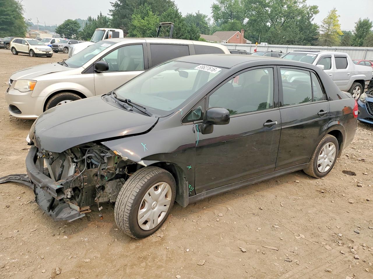 2011 Nissan Versa S, VIN 3N1BC1AP8BL422527 — Front end