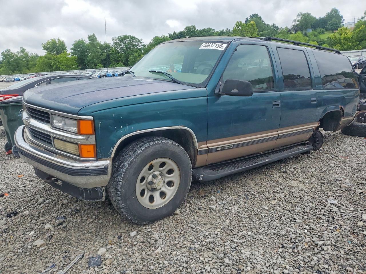 1997 Chevrolet Suburban, VIN 1GNFK16R8VJ409212 — Undercarriage