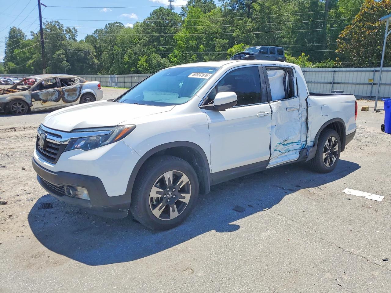 2020 Honda Ridgeline RTL, VIN 5FPYK3F50LB023924 — Side