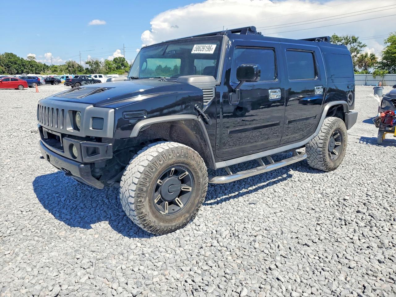 2003 Hummer H2, VIN 5GRGN23U03H120685 — Minor dents and scratches
