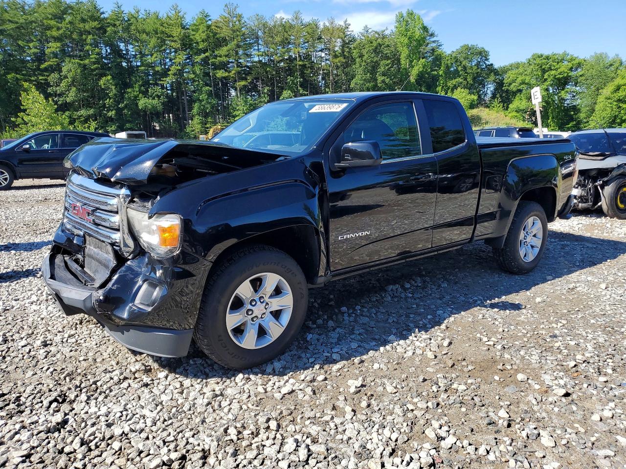 2015 GMC Canyon 4WD SLE, VIN 1GTH6BEAXF1184204 — Front end