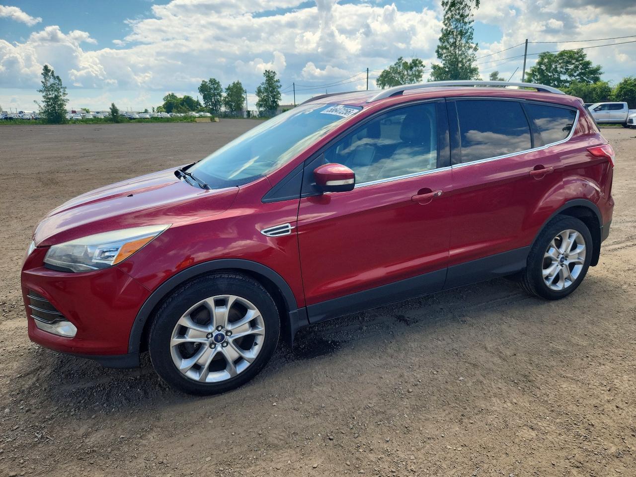 2014 Ford Escape Titanium, VIN 1FMCU9J9XEUA16592 — Water / flood