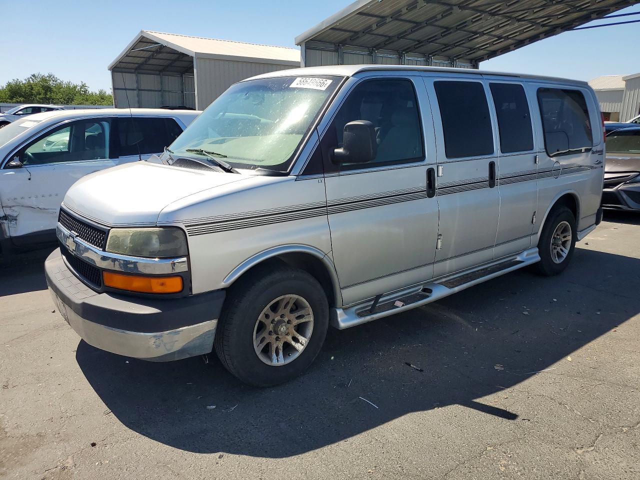 2004 Chevrolet Express Passenger, VIN 1GBFG15T041169518 — Side