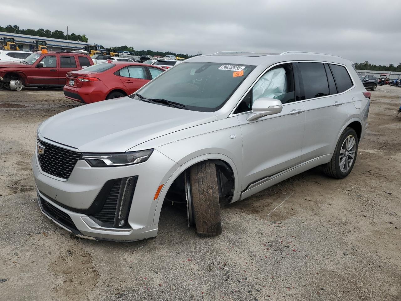 2020 Cadillac XT6 FWD Premium Luxury, VIN 1GYKPCRS2LZ215593 — Бок