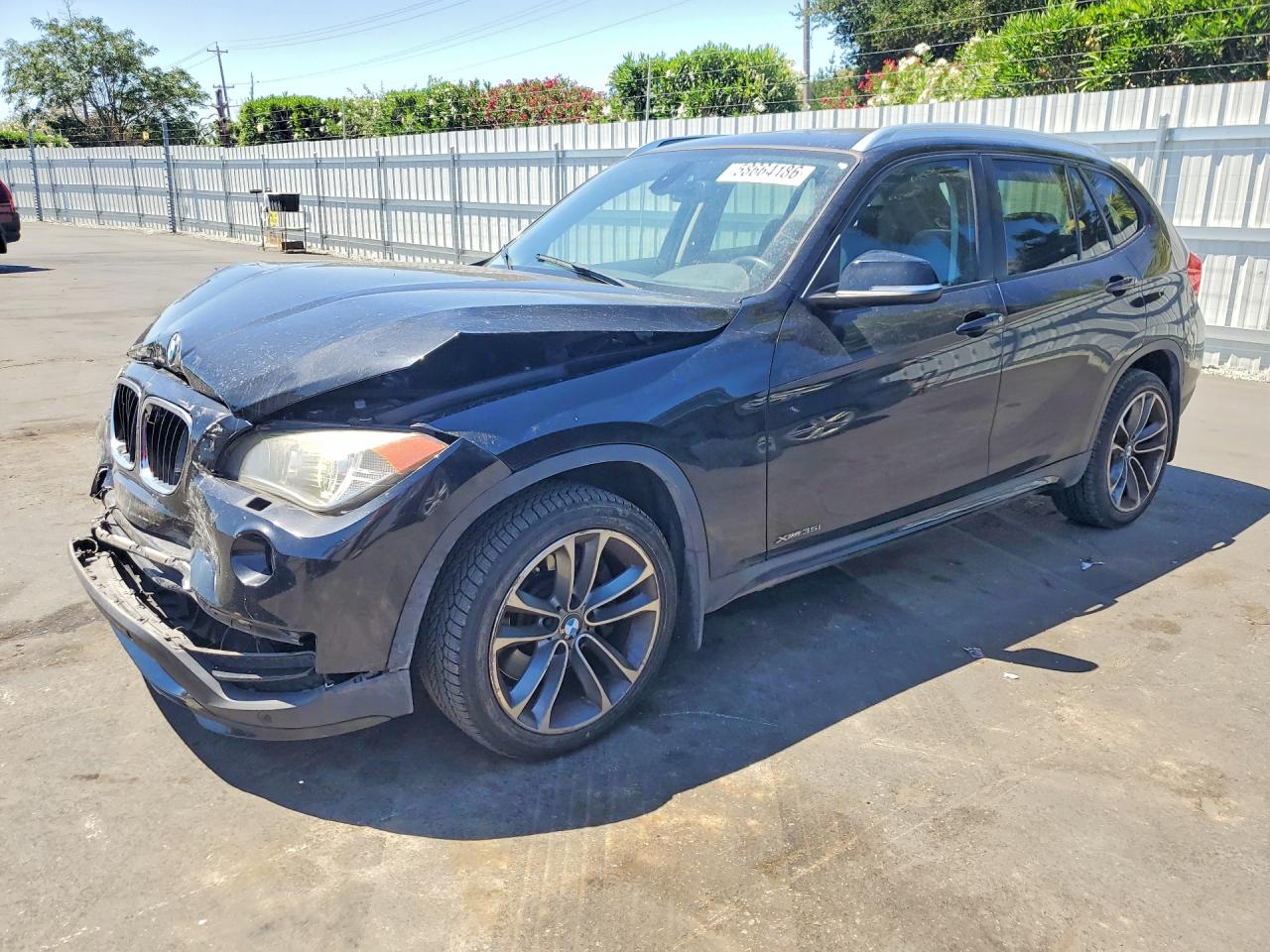 2015 BMW X1 xDrive35i, VIN WBAVM5C54FVV94762 — Front end