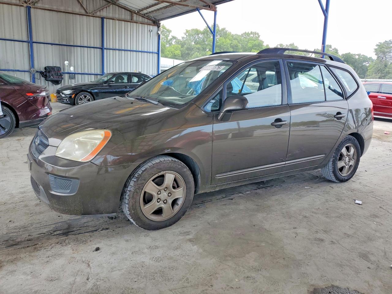 2009 Kia Rondo LX, VIN KNAFG528997264597 — Side