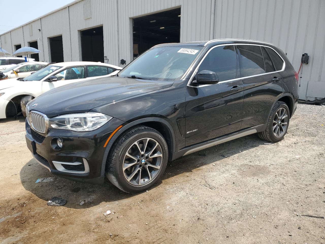 2018 BMW X5 sDrive35i, VIN 5UXKR2C58J0Z16412 — Side