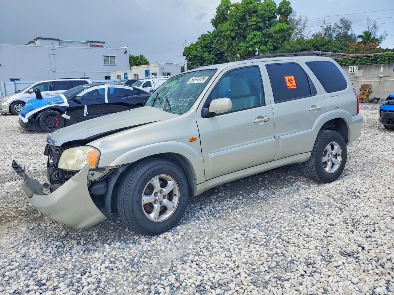 2005 Mazda Tribute S, VIN 4F2YZ04125KM01010 — Side