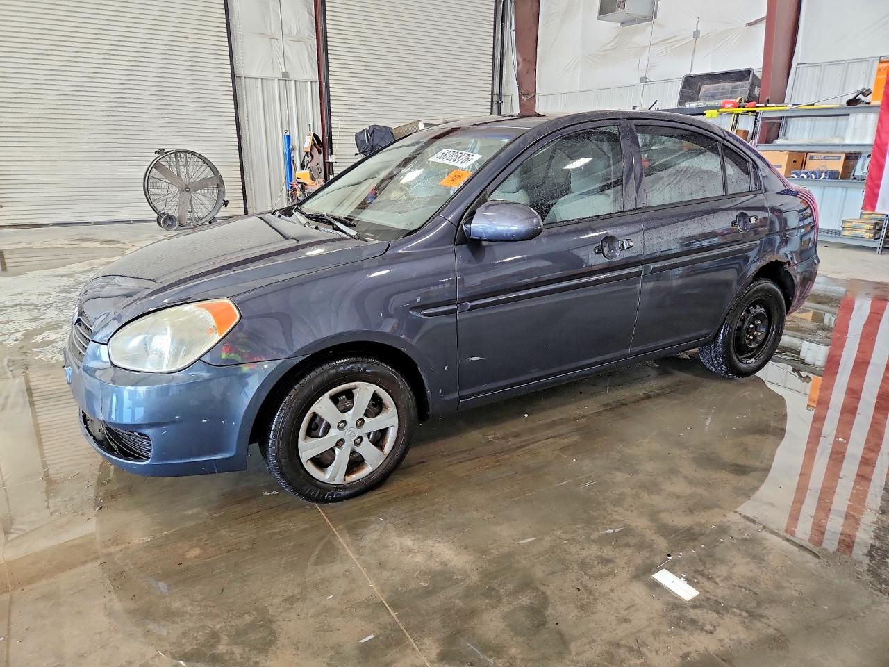 2009 Hyundai Accent Auto GLS, VIN KMHCN46C09U381874 — Side