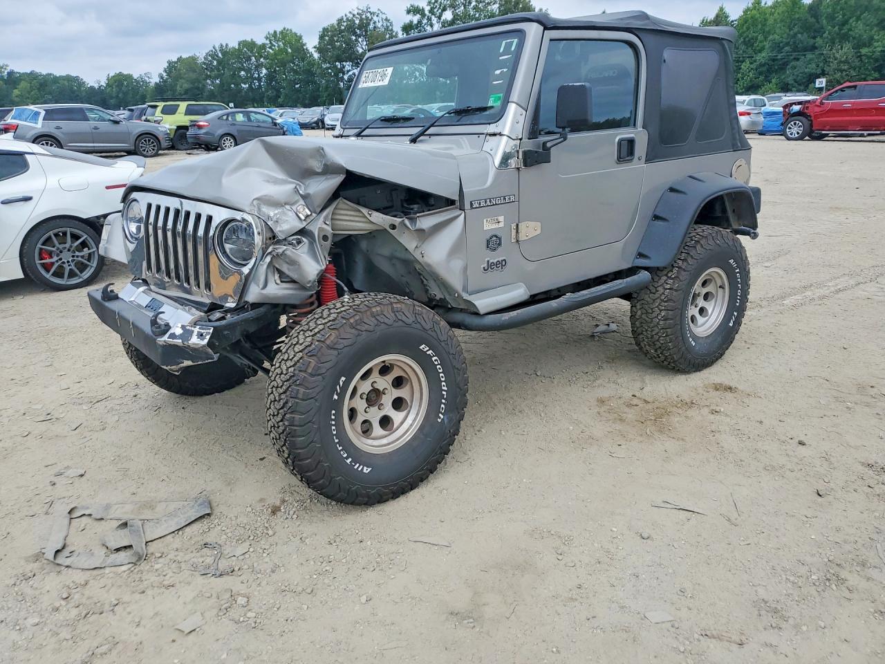 2000 Jeep Wrangler Sport, VIN 1J4F449S1YP769520 — Front end