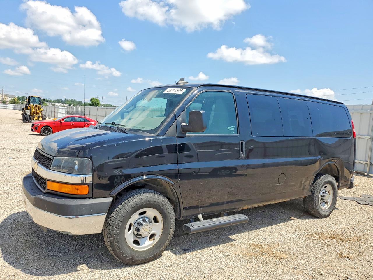2016 Chevrolet Express Passenger LT, VIN 1GAWGFFGXG1240120 — Rear end