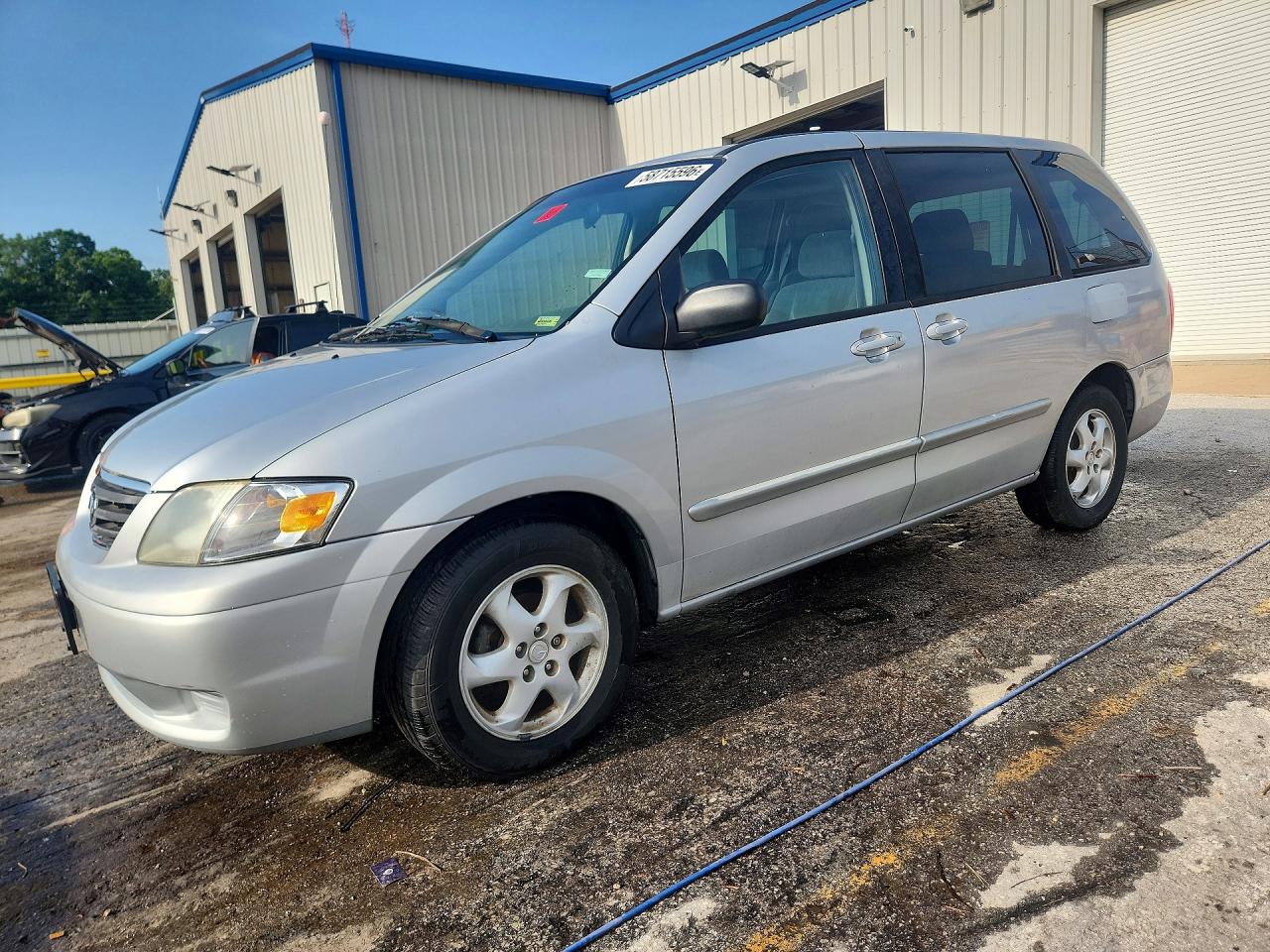 2000 Mazda MPV DX, VIN JM3LW28G3Y0111928 — Hail