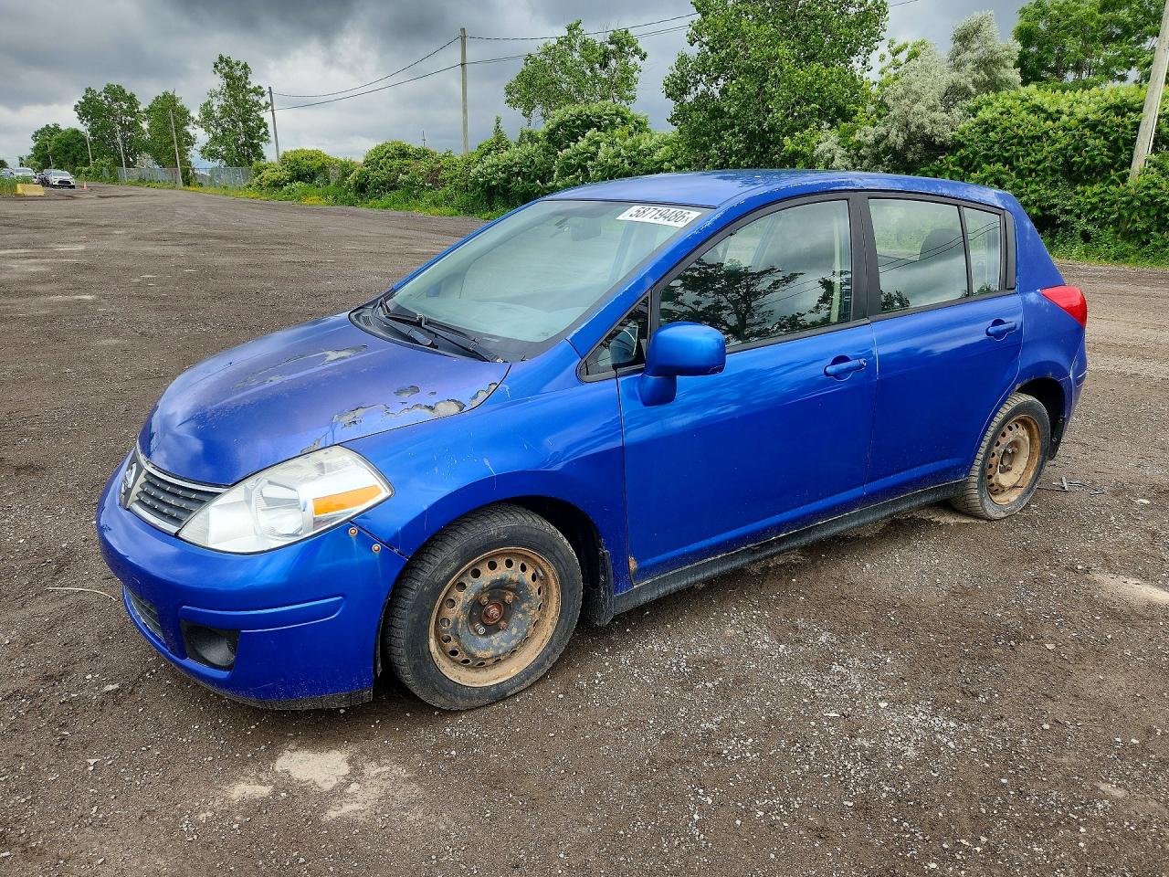 2011 Nissan Versa S, VIN 3N1BC1CP7BL465723 — Water / flood