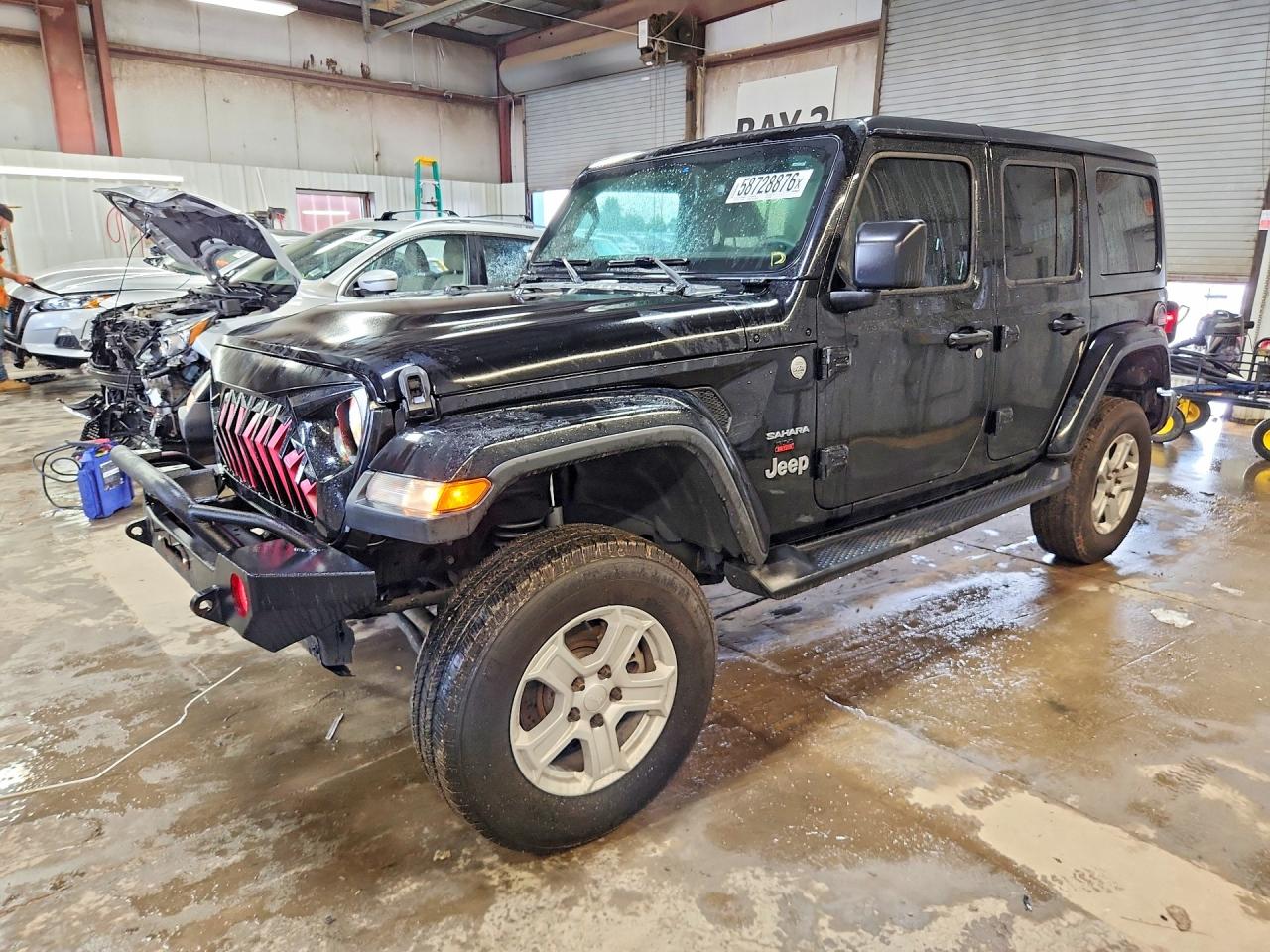 2018 Jeep Wrangler Unlimited Sahara, VIN 1C4HJXEG4JW116766 — Side