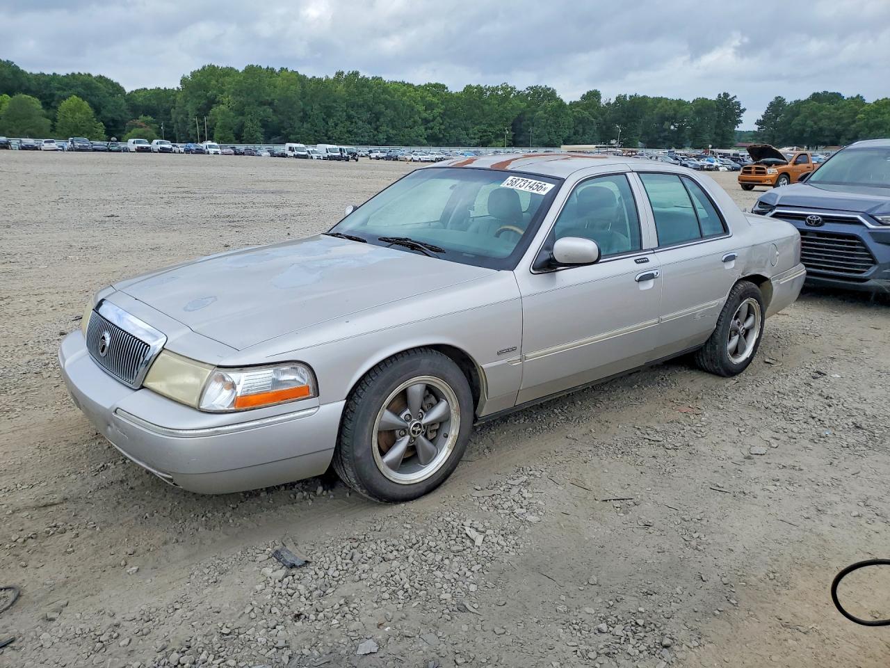 2004 Mercury Grand Marquis LS Premium, VIN 2MEFM75W24X676394 — Undercarriage