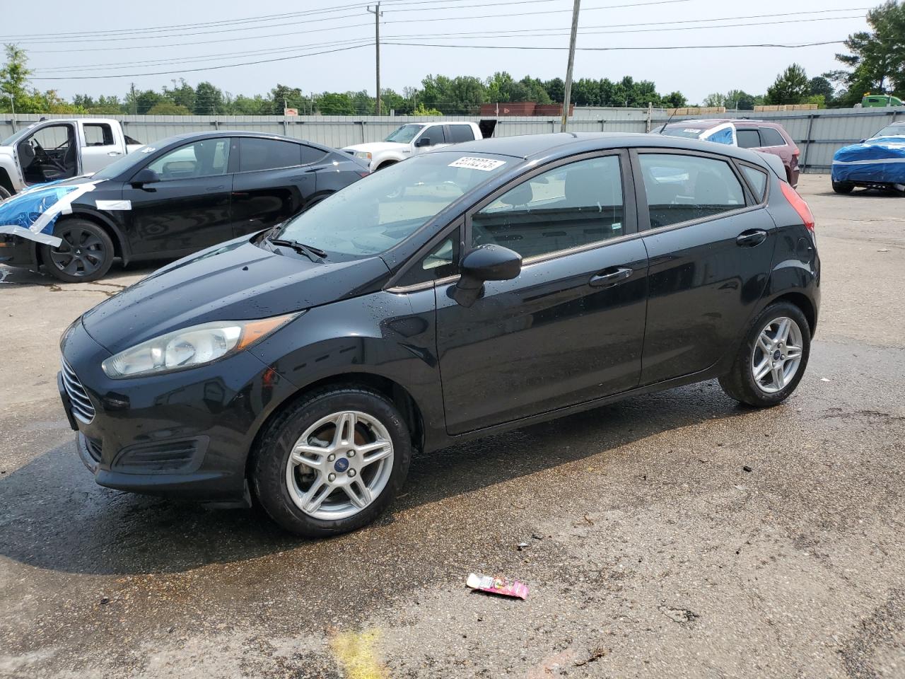 2018 Ford Fiesta SE, VIN 3FADP4EJ2JM120229 — Side