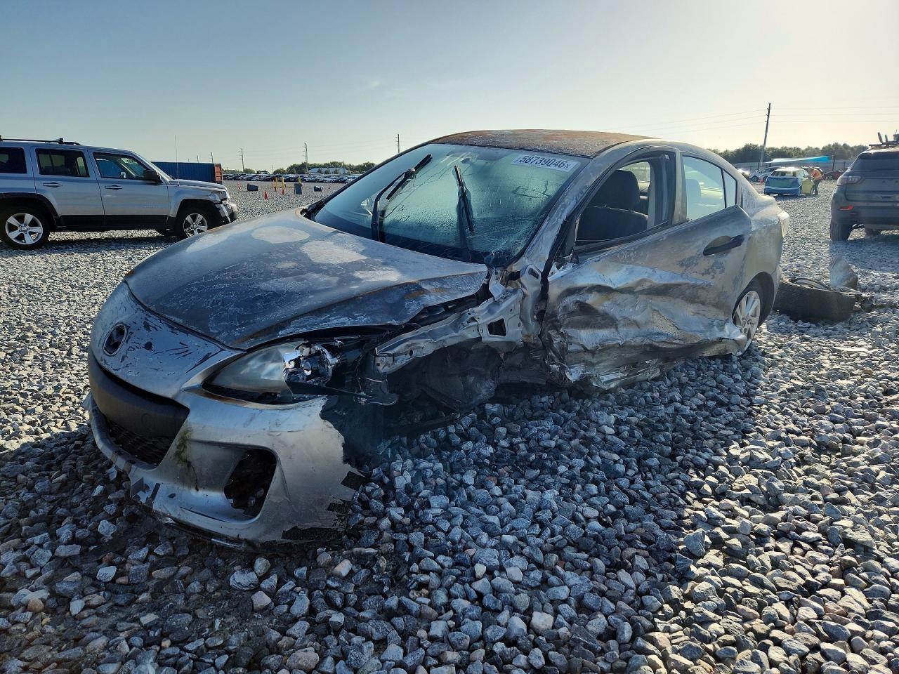 2012 Mazda 3 i Touring, VIN JM1BL1V78C1614823 — Бок