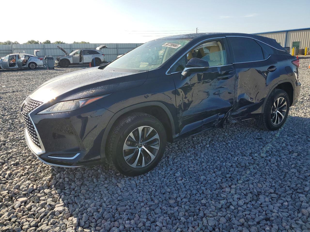 2022 Lexus RX 350, VIN 2T2AZMAA8NC234615 — Бок