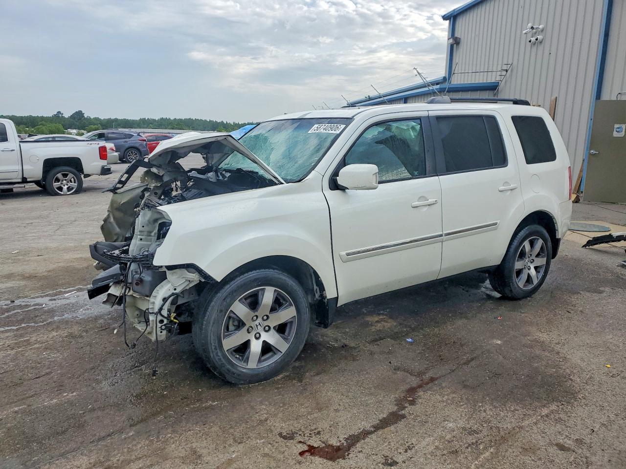 2012 Honda Pilot Touring, VIN 5FNYF3H93CB041749 — Front end