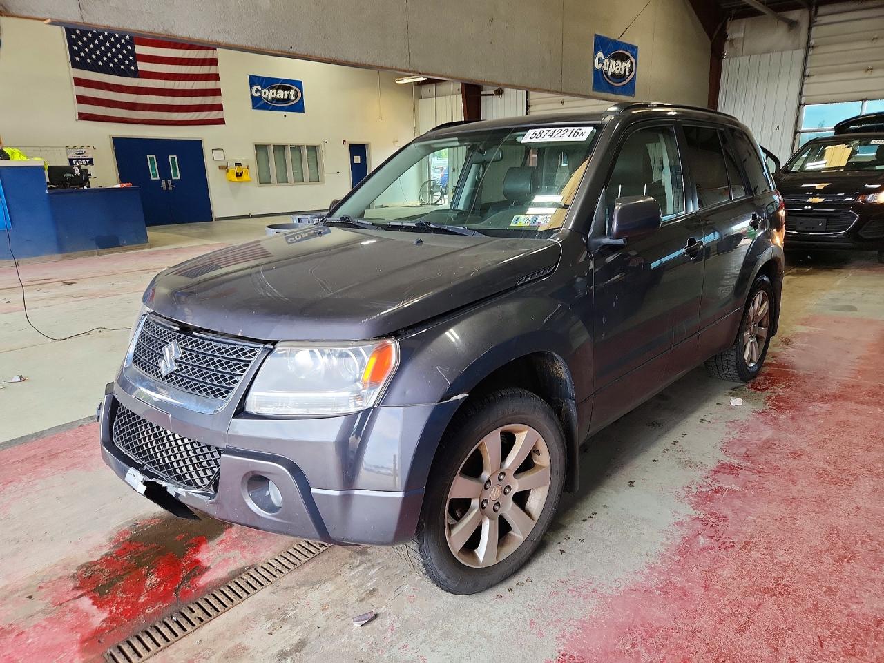 2012 Suzuki Grand Vitara Limited, VIN JS3TD0D73C4101587 — Side