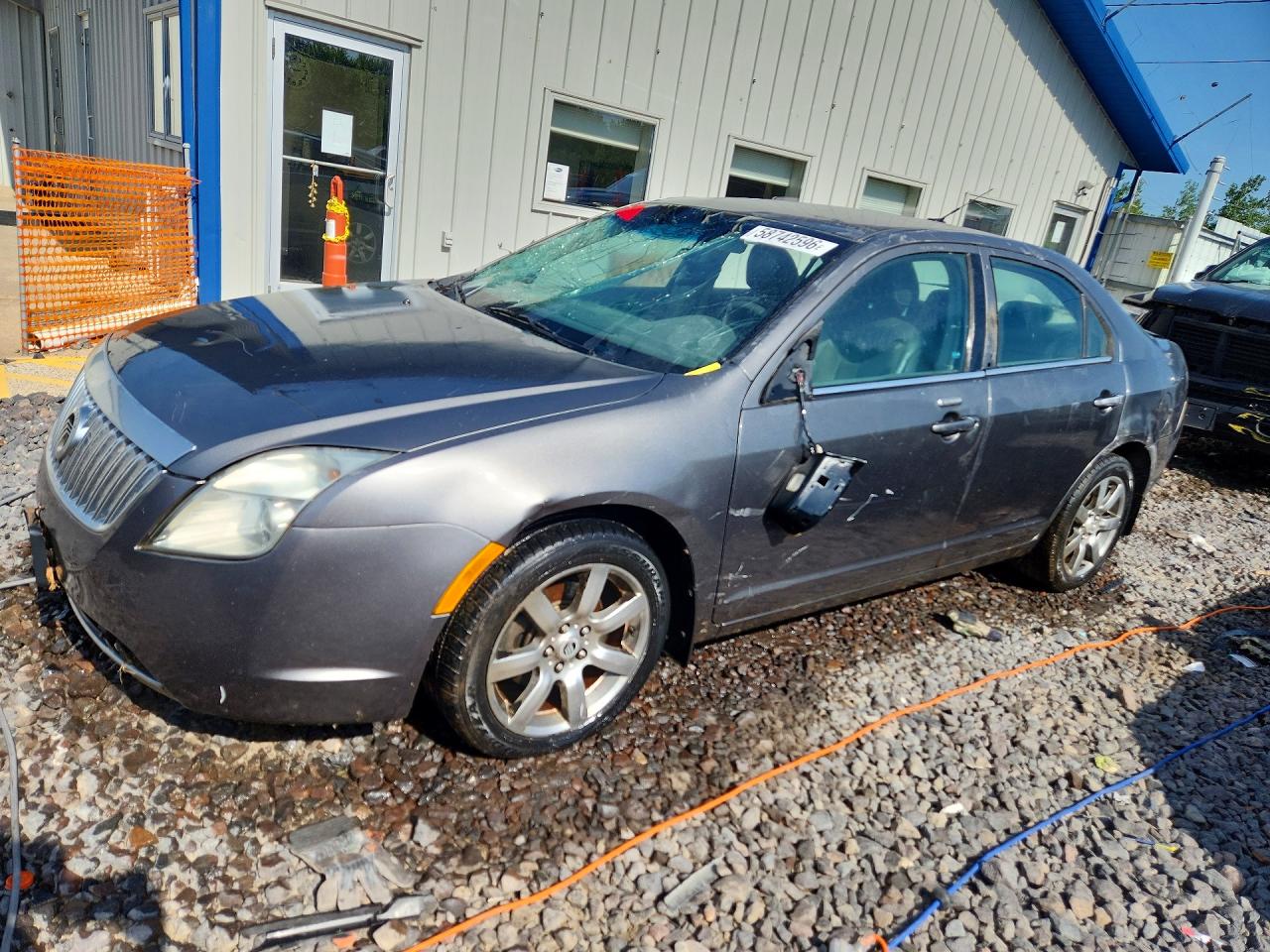 2010 Mercury Milan Premier, VIN 3MEHM0JG2AR653125 — Rollover