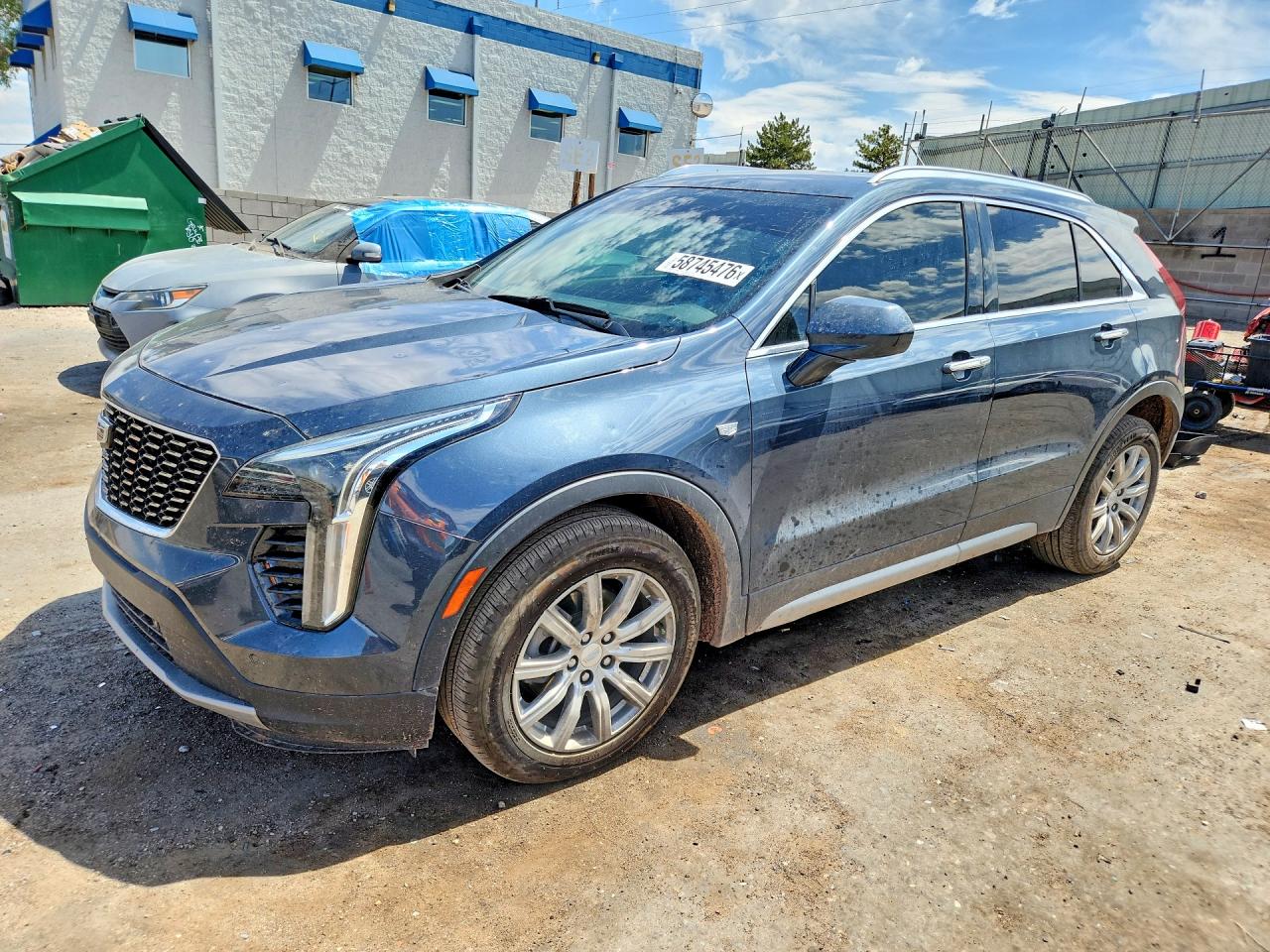 2020 Cadillac XT4 AWD Premium Luxury, VIN 1GYFZDR44LF018266 — Hail