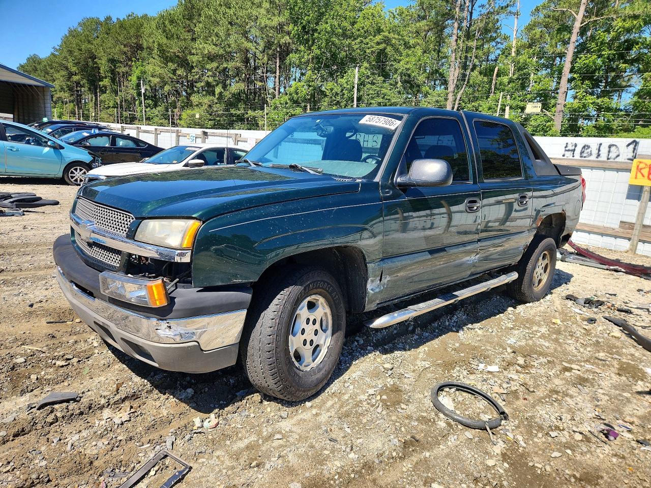 2004 Chevrolet Avalanche Z71, VIN 3GNEK12T04G142967 — Side